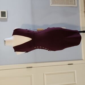 form fitting maroon and gold mid length dress